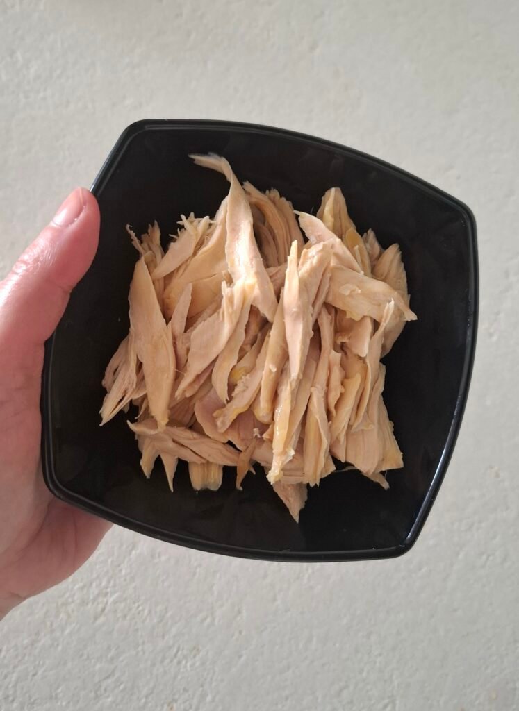 Cappone bollito sfilacciato