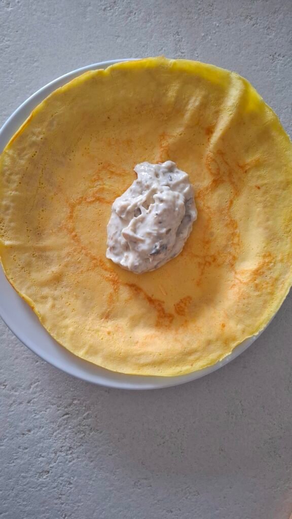 Crepes con crema carciofi