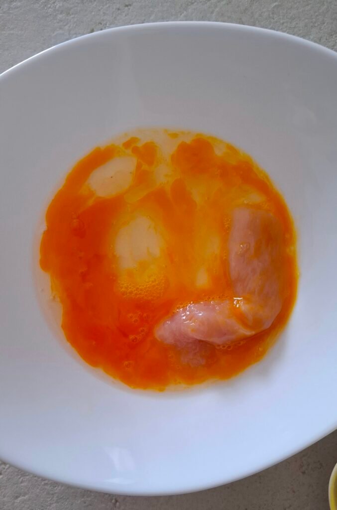 Pezzetti Pollo passato in uovo sbattuto